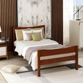 Letto a piattaforma in legno marrone misura singola