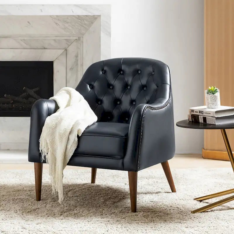 Poltrona a botte classica in vera pelle con gambe in legno e schienale capitonné
